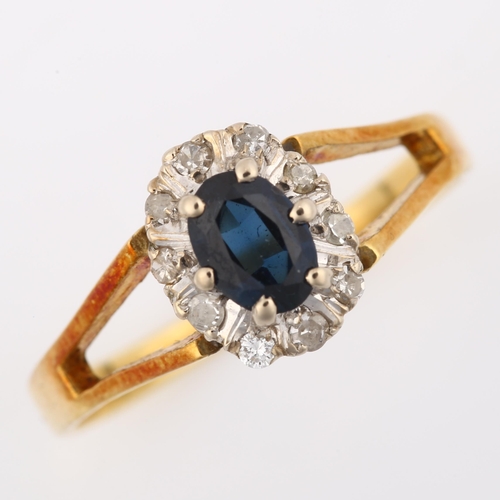 385 - A late 20th century 18ct gold sapphire and diamond cluster ring, set with oval mixed-cut sapphire an... 