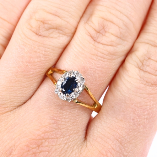 385 - A late 20th century 18ct gold sapphire and diamond cluster ring, set with oval mixed-cut sapphire an... 