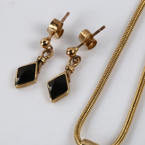 391 - A modern 9ct gold black enamel lozenge matching pendant necklace and earring set, pendant height 28.... 