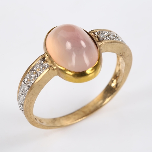 396 - A modern 9ct gold moonstone and diamond dress ring, set with oval cabochon moonstone and modern roun... 