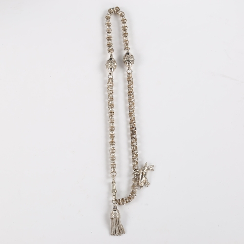 400 - A Victorian Albertina chain necklace, unmarked silver settings with belcher links, pig charm and tas... 