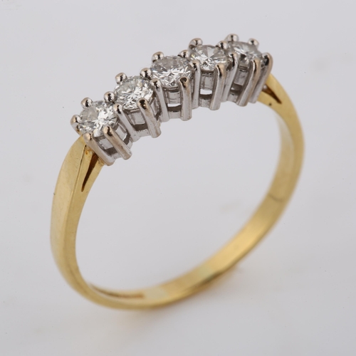 407 - A modern 9ct gold five stone diamond ring, setting height 4.3mm, size K, 2.1g