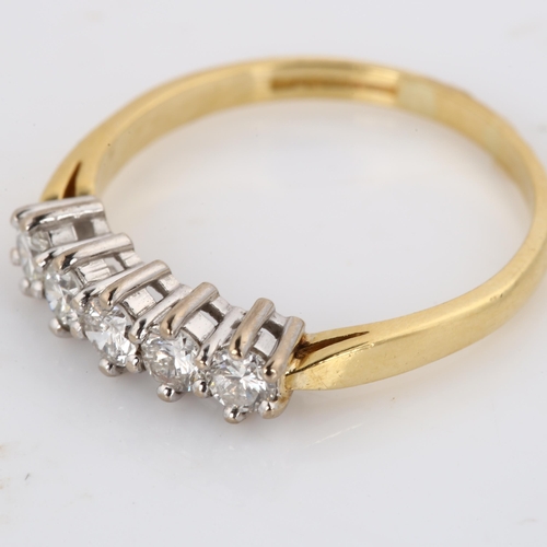 407 - A modern 9ct gold five stone diamond ring, setting height 4.3mm, size K, 2.1g