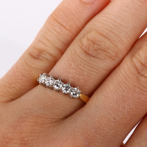 407 - A modern 9ct gold five stone diamond ring, setting height 4.3mm, size K, 2.1g