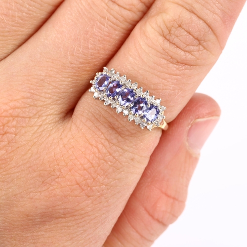 410 - A modern tanzanite and diamond cluster ring, unmarked gold settings, set with oval mixed-cut tanzani... 