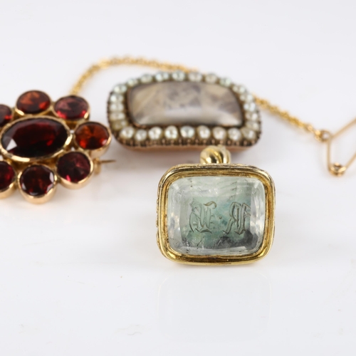 426 - 3 pieces of Victorian jewellery, comprising unmarked yellow metal seal fob, garnet cluster brooch an... 