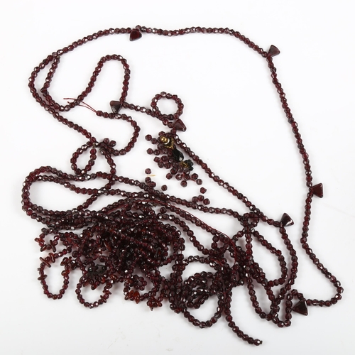 440 - A quantity of faceted garnet beads and necklaces