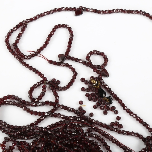 440 - A quantity of faceted garnet beads and necklaces