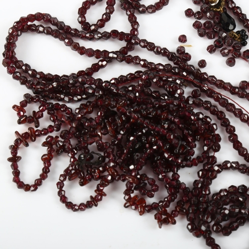 440 - A quantity of faceted garnet beads and necklaces