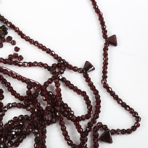 440 - A quantity of faceted garnet beads and necklaces