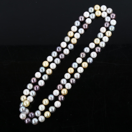 443 - A vari-hue cultured pearl necklace, bead diameter 7.7mm, necklace length 66cm, 55.3g