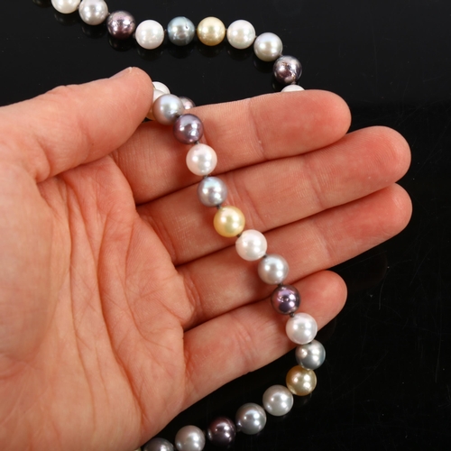 443 - A vari-hue cultured pearl necklace, bead diameter 7.7mm, necklace length 66cm, 55.3g