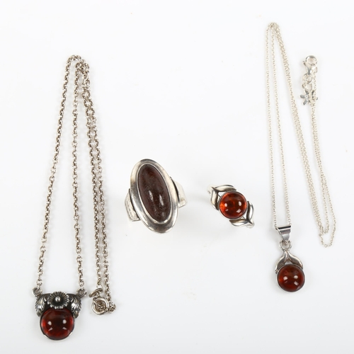 452 - NIELS ERIK FROM - a group of Danish silver and amber jewellery, including pendant necklace, rings et... 