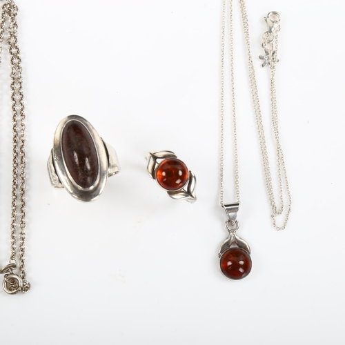 452 - NIELS ERIK FROM - a group of Danish silver and amber jewellery, including pendant necklace, rings et... 