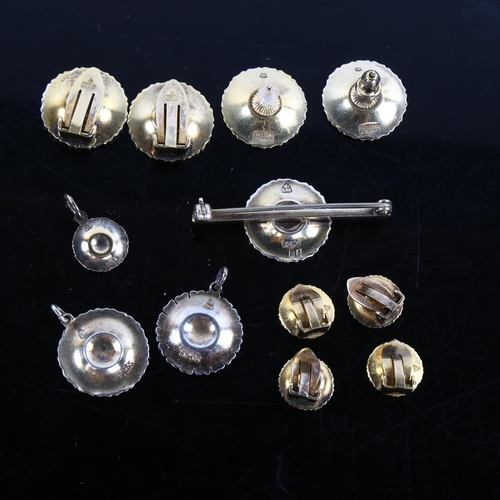 454 - A group of Danish vermeil sterling silver and white enamel daisy pattern jewellery, including pendan... 