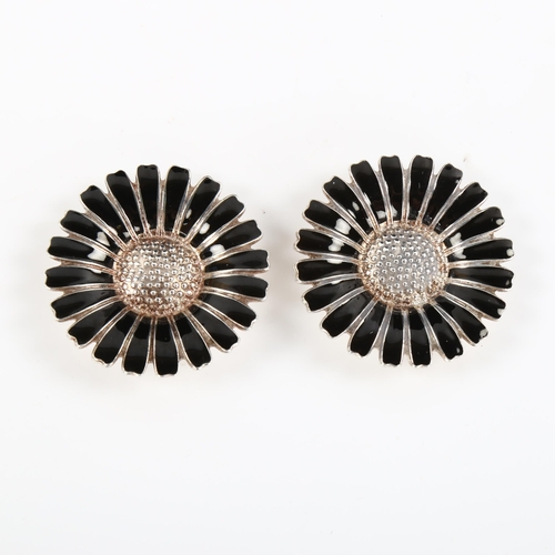 456 - BERNHARD HERTZ - 2 Danish sterling silver and black enamel daisy pattern brooches/shoe slides, diame... 