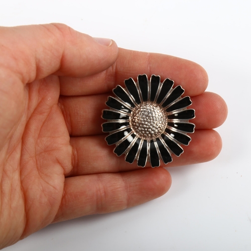 456 - BERNHARD HERTZ - 2 Danish sterling silver and black enamel daisy pattern brooches/shoe slides, diame... 