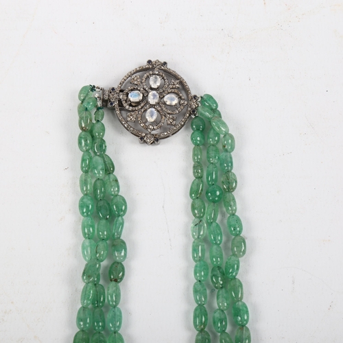 474 - A triple-strand emerald bead necklace, with moonstone sapphire and diamond set clasp, necklace lengt... 