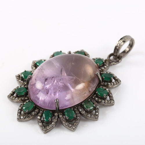 475 - A modern amethyst emerald and diamond cluster flowerhead pendant, set with 38.4ct oval cabochon amet... 