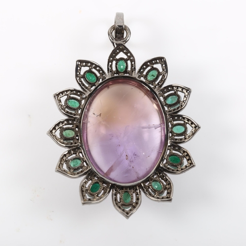 475 - A modern amethyst emerald and diamond cluster flowerhead pendant, set with 38.4ct oval cabochon amet... 