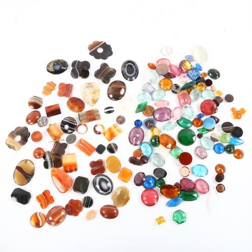 486 - A quantity of loose gemstones and jewellery findings, including banded agate jasper etc