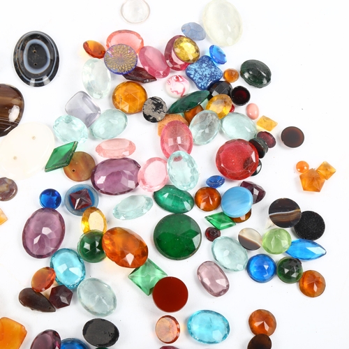 486 - A quantity of loose gemstones and jewellery findings, including banded agate jasper etc