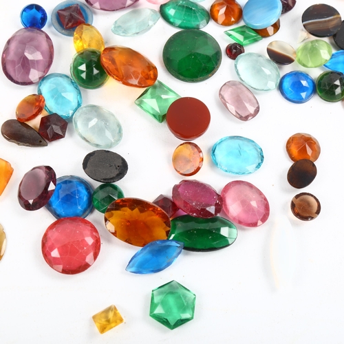 486 - A quantity of loose gemstones and jewellery findings, including banded agate jasper etc