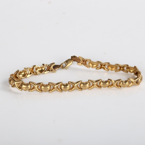 490 - A 9ct gold heart and cross bracelet, length 18cm, 4.1g