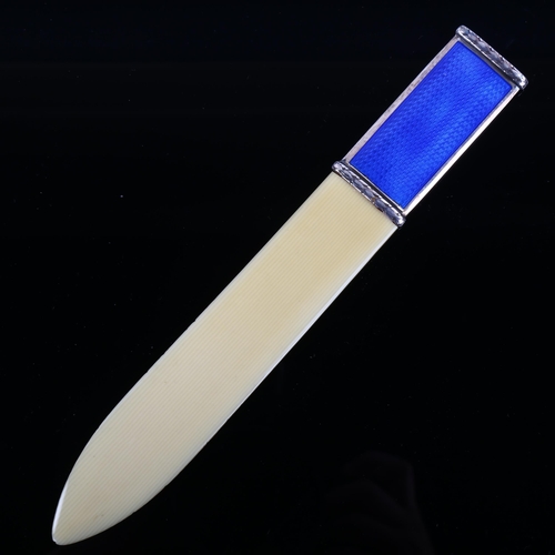 501 - A Scandinavian silver and blue enamel paper knife, with ivorine blade, overall length 19.5cm