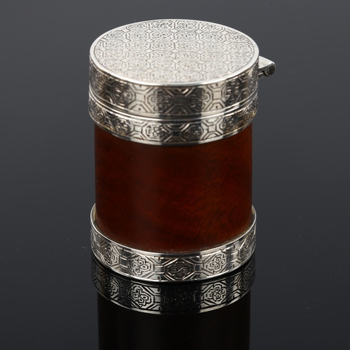 504 - A good quality Japanese? silver-mounted fruitwood cylinder box, allover engraved decoration with cha... 