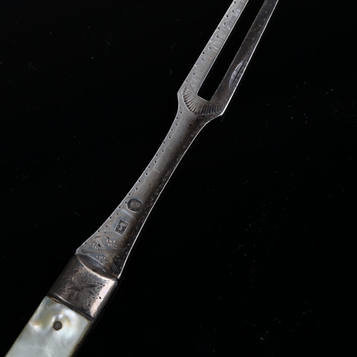 507 - A George III silver folding fruit fork, no maker's mark, with mother-of-pearl handle, overall length... 