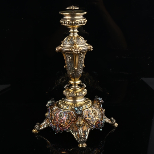 512 - An Austrian 800 silver-gilt tazza base, ornate repousse foliate and fruit swag decoration, with lion... 