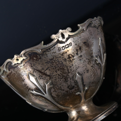 515 - An Edwardian silver Gothic pedestal bowl, with raised decoration, by James Deakin & Sons, hallmarks ... 