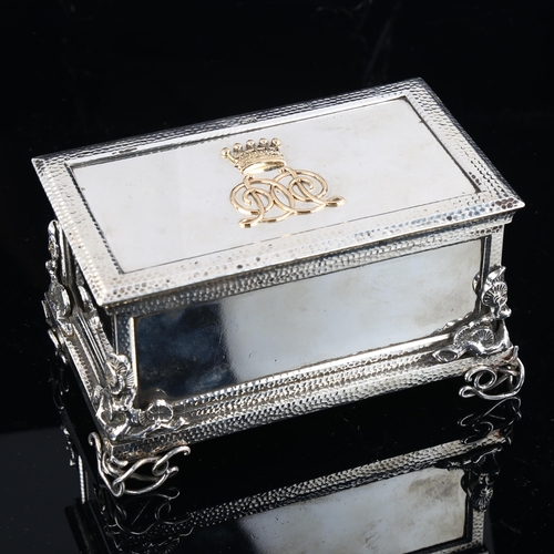 520 - A fine quality Victorian cast-silver and gold desk casket, rectangular form, with hand planished dec... 