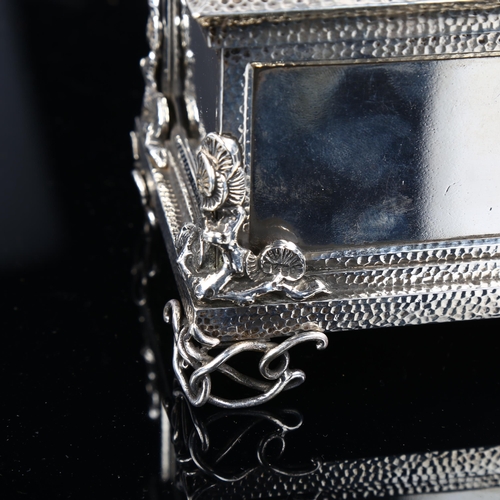 520 - A fine quality Victorian cast-silver and gold desk casket, rectangular form, with hand planished dec... 