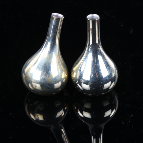 523 - QUISTGAARD for DANSK DESIGNS - a pair of Danish silver plated leaning onion candle taper stick holde... 