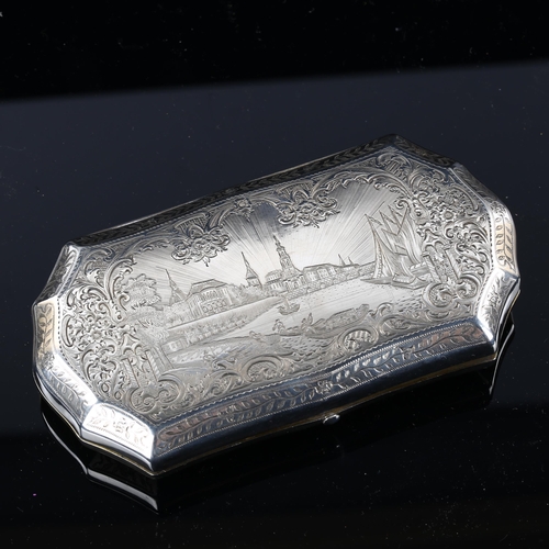 528 - A large Russian 84 zolotnik standard silver cigarette case, engraved St Petersburg view lid and flor... 