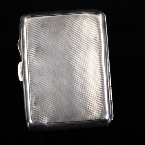 532 - An Art Deco George VI curved silver cigarette case, allover engine turned decoration with gilt inter... 