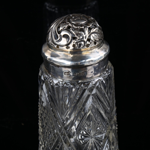 539 - An Edwardian silver-mounted glass sugar caster, with relief embossed floral decoration, indistinct m... 