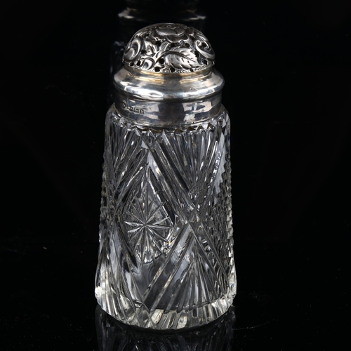 539 - An Edwardian silver-mounted glass sugar caster, with relief embossed floral decoration, indistinct m... 