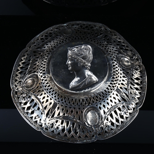 542 - A German silver commemorative dish, Augsburg, with relief embossed Royal Princess profile, with pier... 