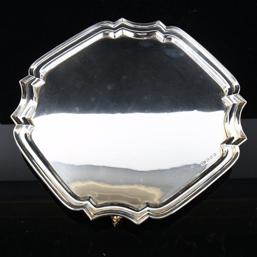 545 - A large George Vi silver salver, square-shaped form with scrolled acanthus leaf feet, by Viner's Ltd... 