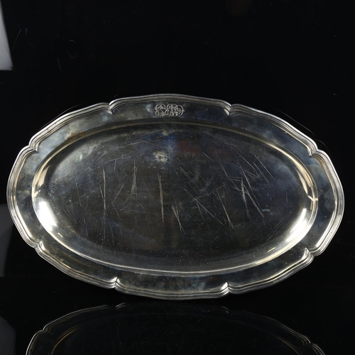 548 - A large German 800 silver oval tray, lobed form with reeded rim, by Gebr. Friedlaender, width 58cm, ... 