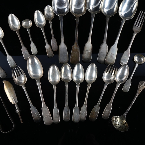 555 - Various silver cutlery and flatware, including Fiddle pattern tablespoons, sifter spoon, sugar tongs... 