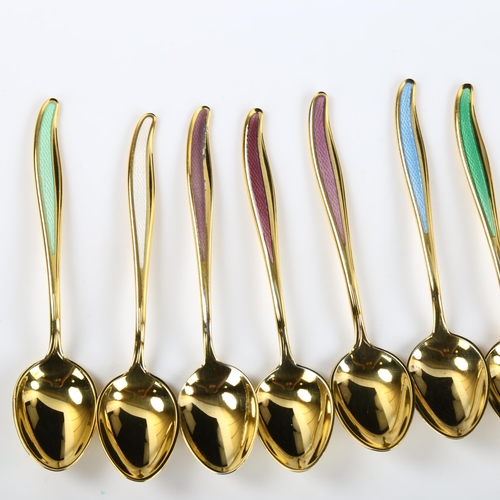 557 - ABSA - a set of 12 Danish vermeil sterling silver and harlequin enamel coffee spoons, length 9cm