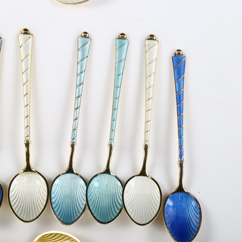 558 - EGON LAURIDSEN - a set of 12 Danish vermeil sterling silver and harlequin enamel coffee spoons and m... 