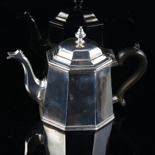 586 - A George V silver teapot, tapered octagonal form with ebonised handle, by Edward Barnard & Sons Ltd,... 