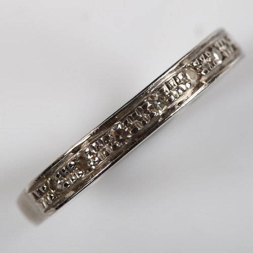 406 - An early 20th century palladium diamond half eternity ring, set with single-cut diamonds, setting he... 