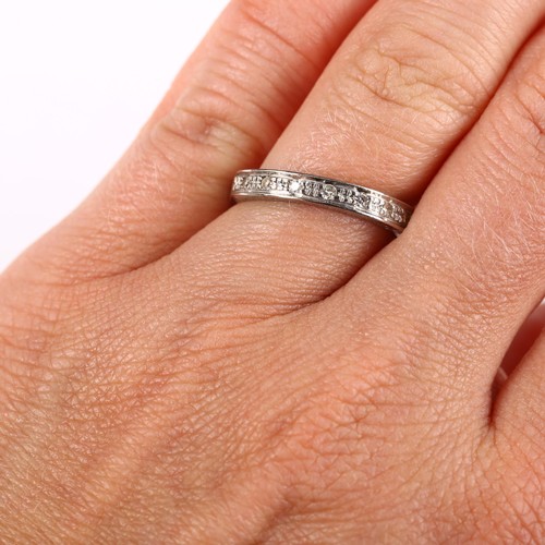 406 - An early 20th century palladium diamond half eternity ring, set with single-cut diamonds, setting he... 