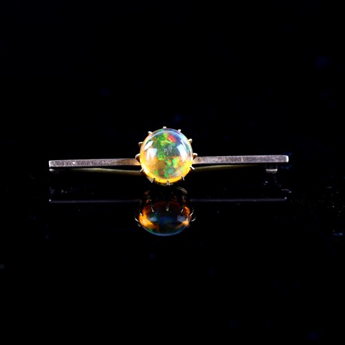 192 - An Antique 9ct rose gold fire opal bar brooch, set with round cabochon fire opal, opal measures: 10.... 